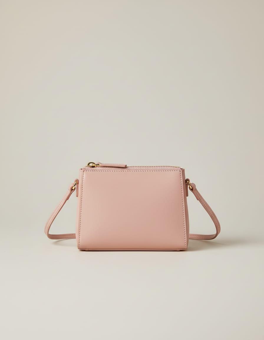 Solene Mini Crossbody, front view on a studio backdrop